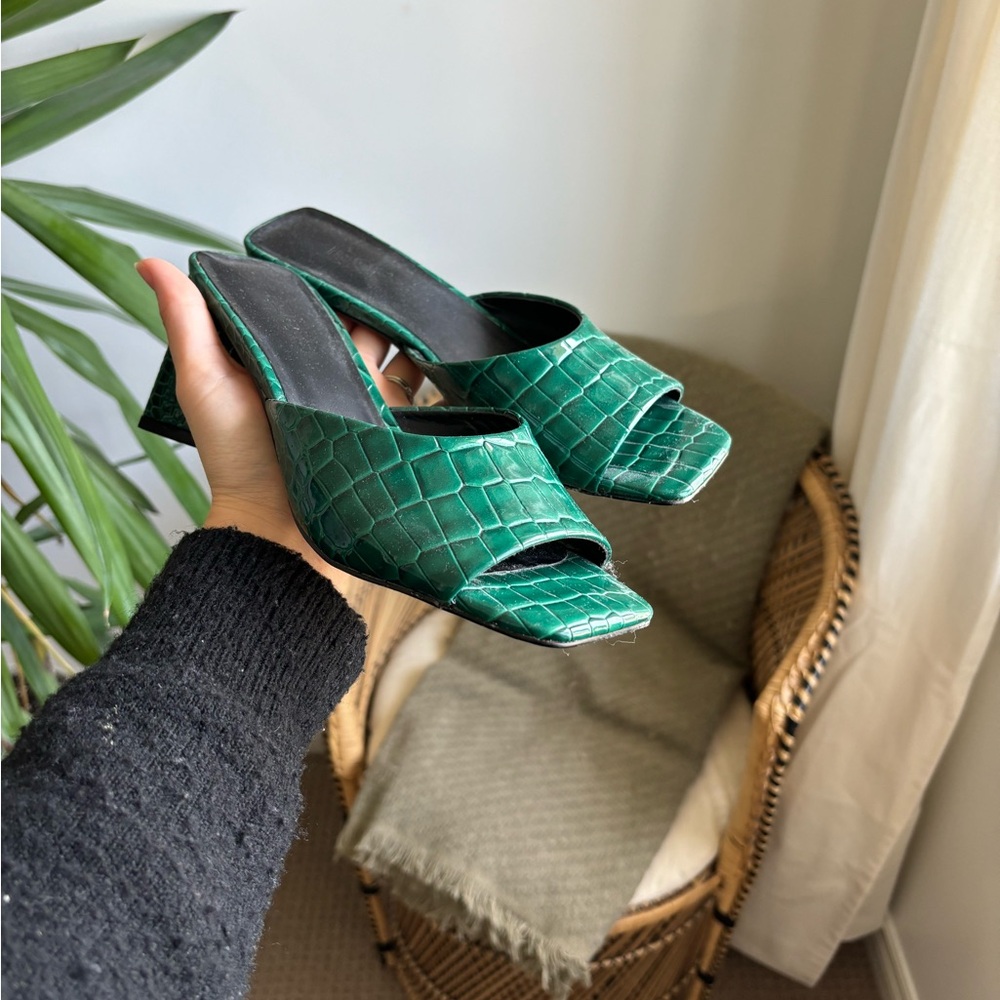 Green crocodile style heels.
